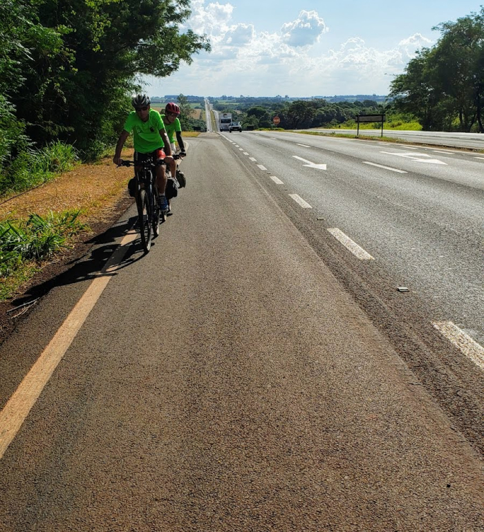 Boys on bikes on a hill, illustrating the definition of stamina.